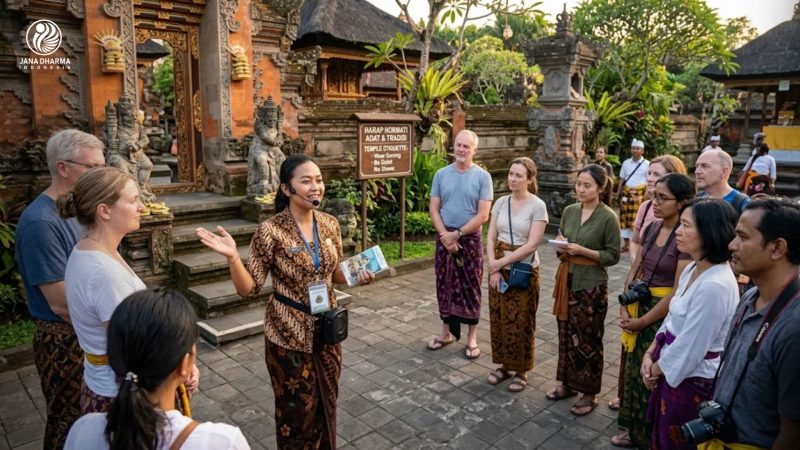 Pemandu wisata profesional sedang memberikan arahan etika budaya lokal kepada sekelompok turis asing.